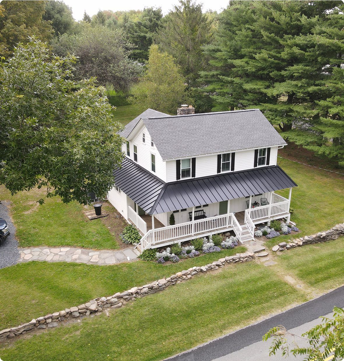 Aerial view of a white country house.